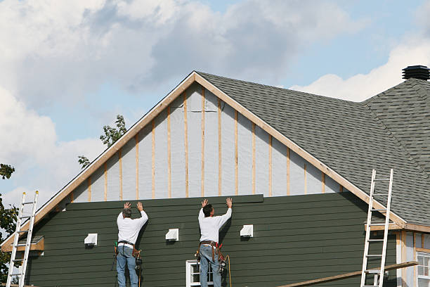 Professional Storm Damage Siding Repair technician working in North Carolina, NC